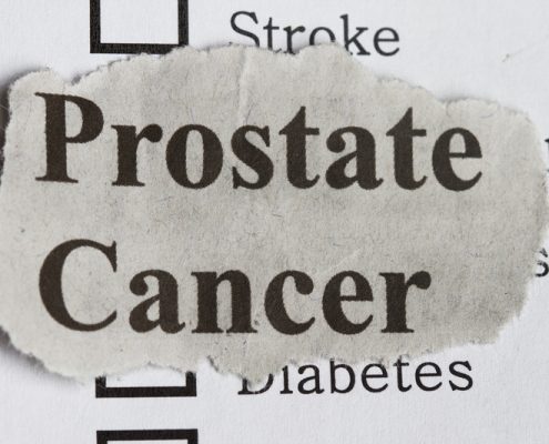 A piece of paper with the words prostate cancer written on it.