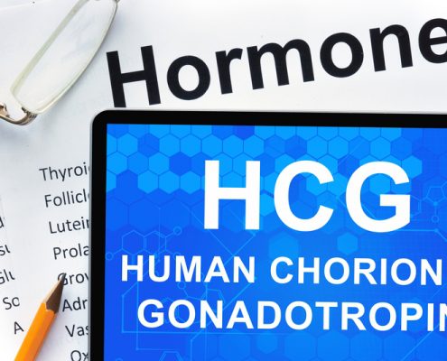 A tablet with the words hcg on it.