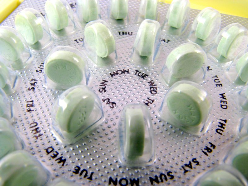 A close up of many pills on the table