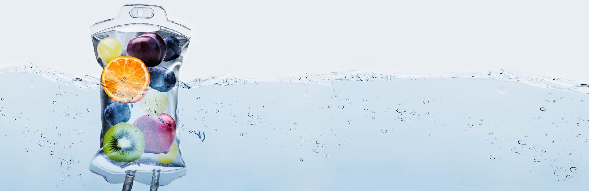 A view of the ocean with many bubbles in it.